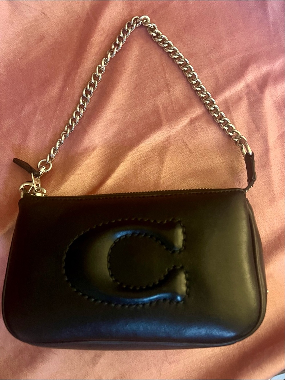 Coach Nolita 19 black leather bag with silver-tone chain handle and quilted C